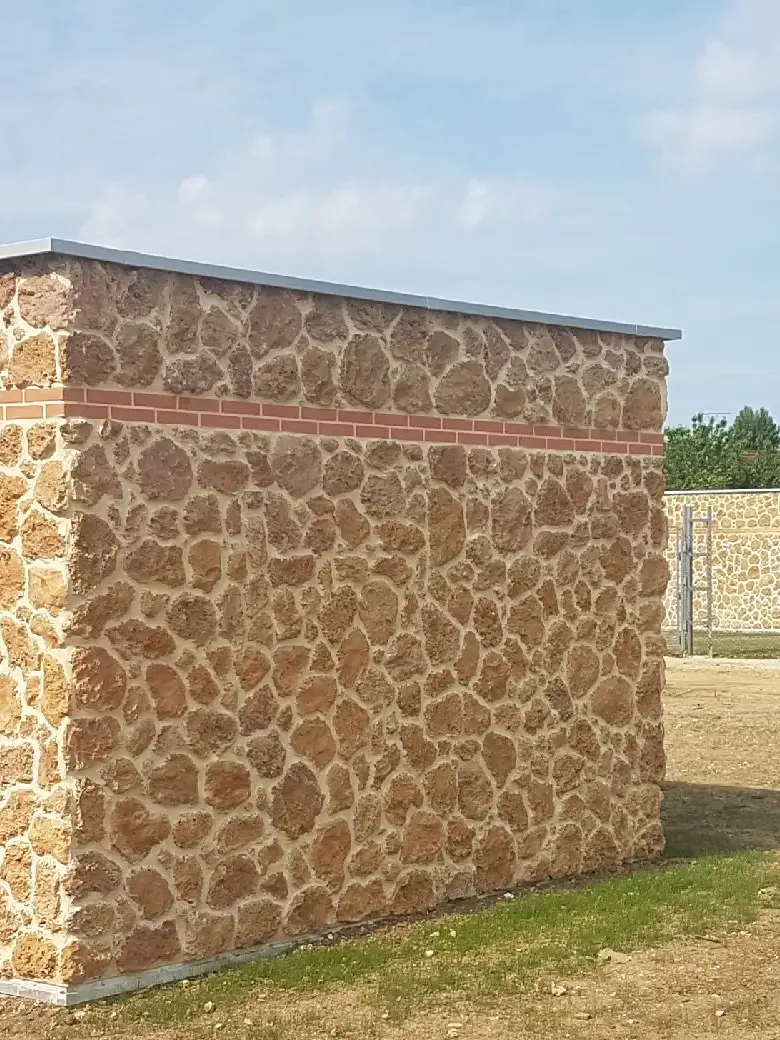 Bâtiment pierre de parement Meulière