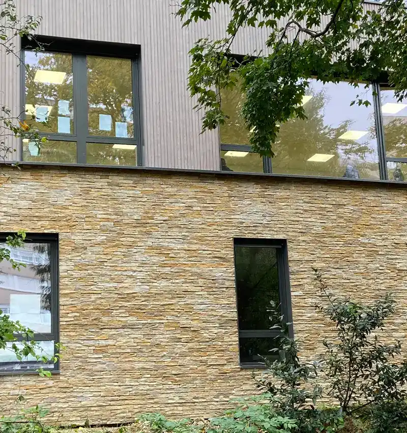 Immeuble en parement pierre Schiste Évolution La Rochette